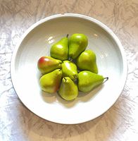 Top view of crackle-glaze bowl with scale reference (pears)