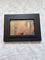 Front view of black 4x6 picture frame with sample photo