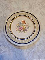 Front view showing full floral design and trim