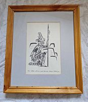 Framed print showing full view within wood frame