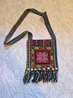 Front view showing patterns, Jerusalem text, fringe and beads