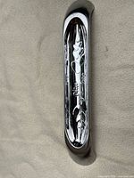 Full view of polished stainless steel olive tray