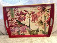 Top view of floral serving tray showing interior design and handles