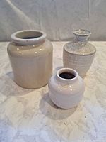 Group shot of the three vases/jars