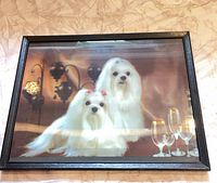 Framed 3-D print of two long-haired white dogs under glass