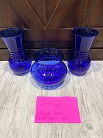 all three cobalt blue glass vases on display