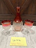 front view showing decanter and two goblets