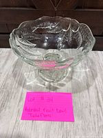 Overview of clear glass Teleflora pedestal fruit bowl showing leaf pattern and pedestal base