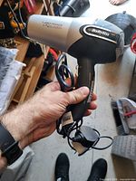 Overall view of BaByliss Turbo Power 2200 hair dryer showing body, handle, controls and cord