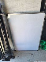 Front view of whiteboard showing full surface, frame, and condition