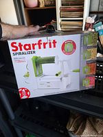 Boxed Starfrit spiralizer showing product image and branding
