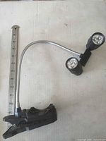 Full view of clip lamp with measuring scale