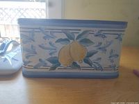 front view of lemon motif ceramic canister