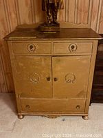 Front view of closed chest showing hardware and finish