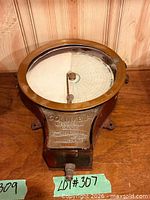 Full view of Columbia recording gauge showing housing, glass window, and dial