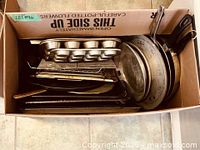 overview of box contents including muffin pan and various bakeware