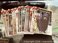 Stack of Canadian Geographic magazines, approximate count visible
