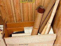 Box holding multiple rolled maps/prints