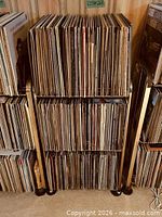 Full view of record stand filled with vinyl records