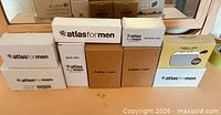 Front view of all nine Atlas For Men boxes
