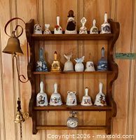 Wall-mounted display showing entire assortment of bells