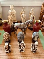 Group shot showing all figurines, eggs, vases and metal horse