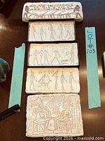 All four plaques laid out to show quantity and overall condition