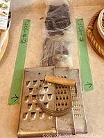 Entire lot showing graters, pastry blender and bagged nutcracker set