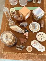 Overall view showing majority of items laid out on table