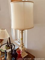 Full view of lamp with shade showing overall design and height