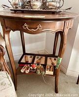 Full view of wood console table with drawer and lower shelf