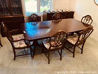 Full dining table with chairs