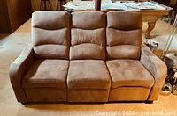 front view of full sofa showing three seats and segmented back cushions