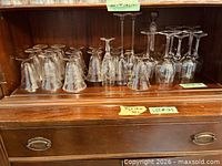 Shelf showing entire assortment of inverted and upright crystal stemware