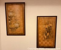 Both framed artworks hanging side by side, full view