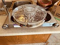 Hot plate with glass tray on top showing both items together