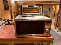Panasonic microwave and GE toaster oven together