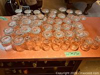 Group of vintage Olympic stemware lined on countertop