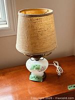 Full view of lamp with shade and power cord