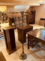 Full view of metal torchiere floor lamp