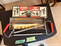Full set displayed: springs, handles, instruction sheet and box