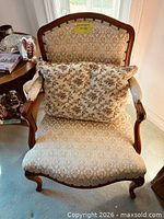 Front view showing full armchair with cushion