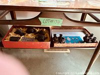 Both boxes on shelf showing contents