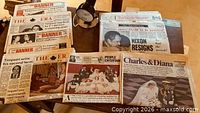 Group shot showing eight newspapers including Toronto Star Nixon headline, Charles & Diana section, multiple Era and Banner issues