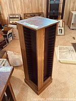 Full view of wood VHS storage tower front and side