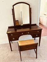 Vanity table with mirror and bench full view