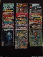Full lot showing four vertical stacks of 24 bagged comics