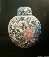 Front view of ginger jar showing floral and paisley decoration