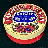 Lid of storage box showing Camembert Extra-Fin graphic