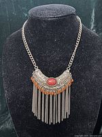 Full view of necklace on bust showing overall design
